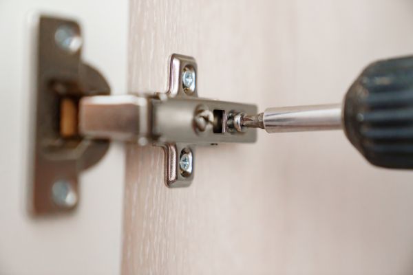 Cupboard Hinge Repair in Midlothian